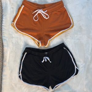 BOTH lounge shorts, orange/yellow trim and black/white trim